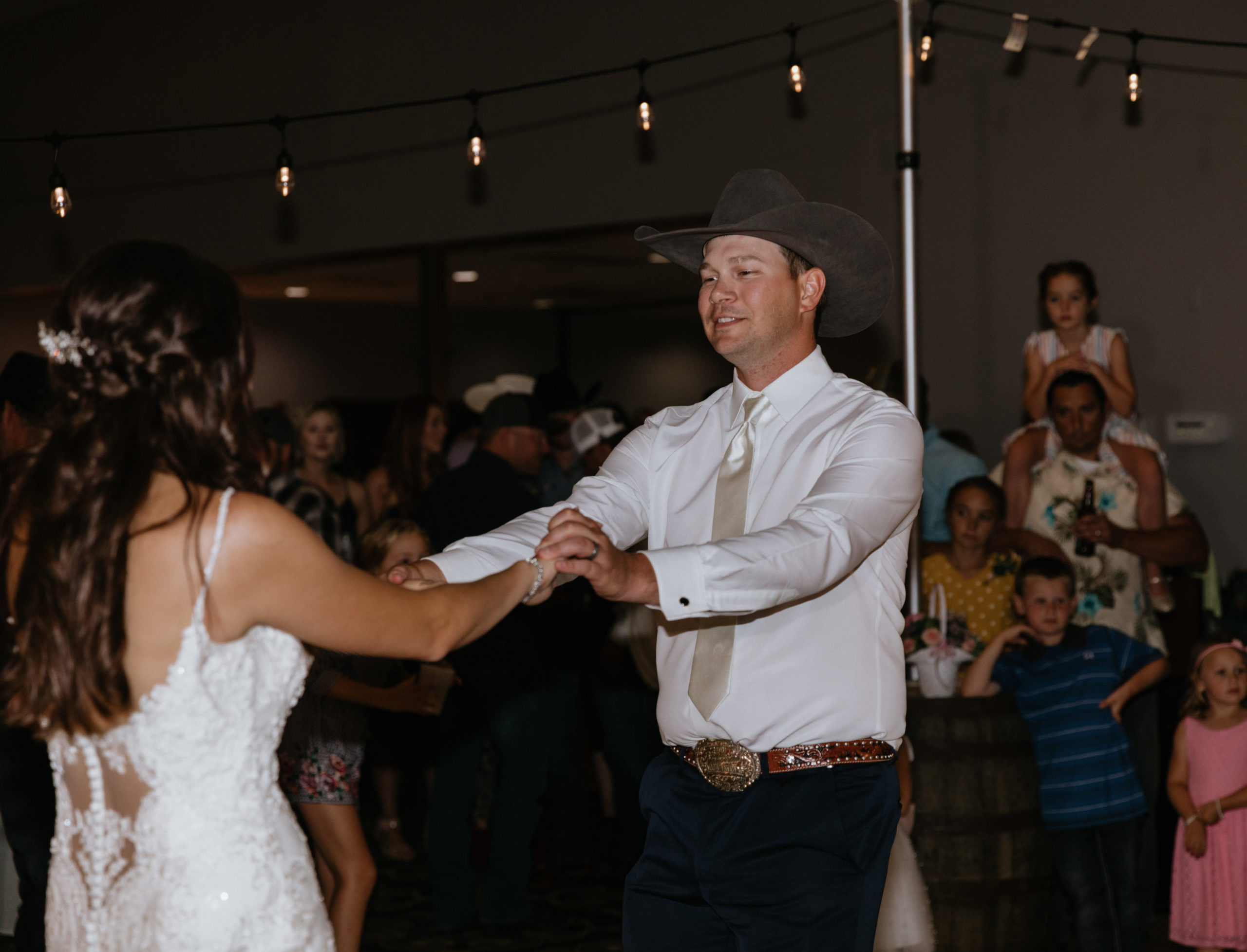 Wyatt leads Heidi during their first dance.