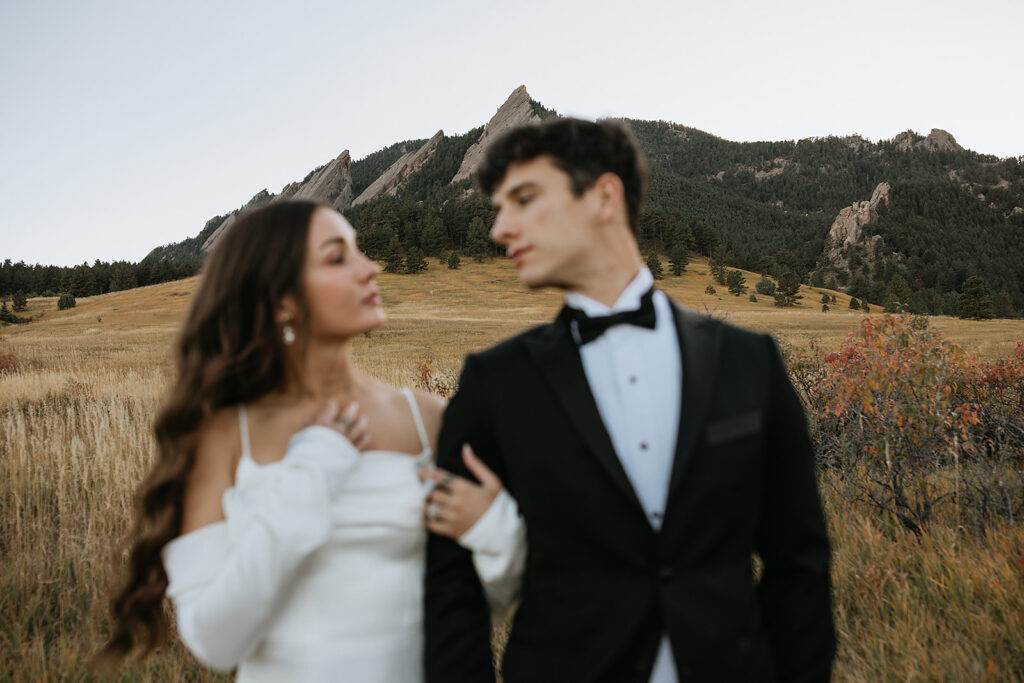 Picture of the bride and groom, smiling at each other