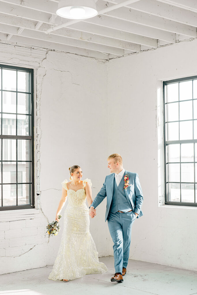 couple holding hands during their session