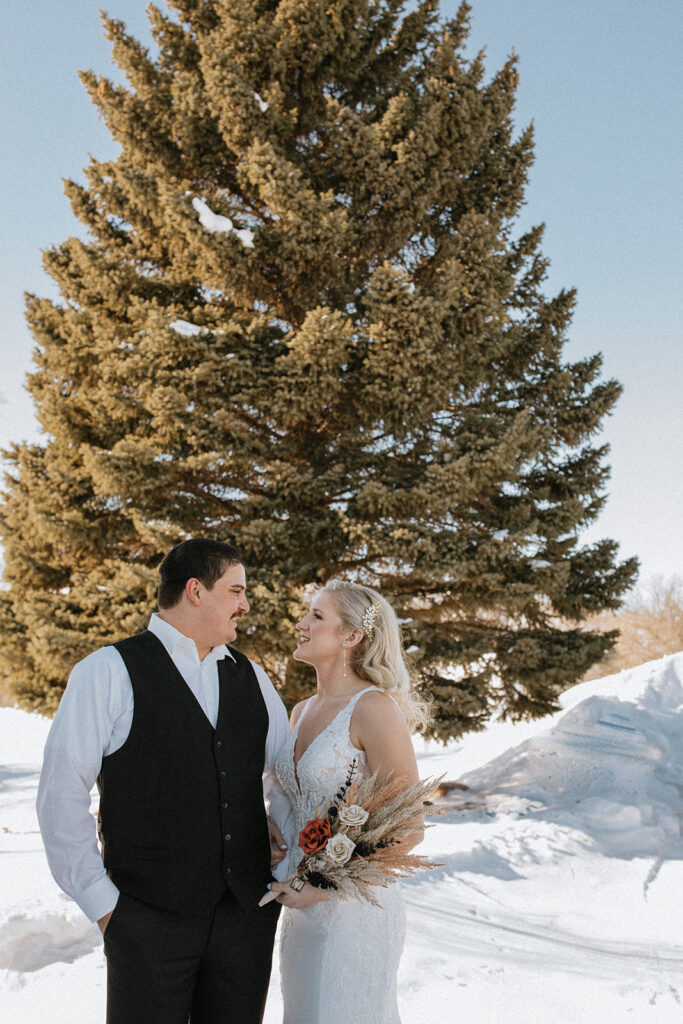 bride and groom looking at each other
