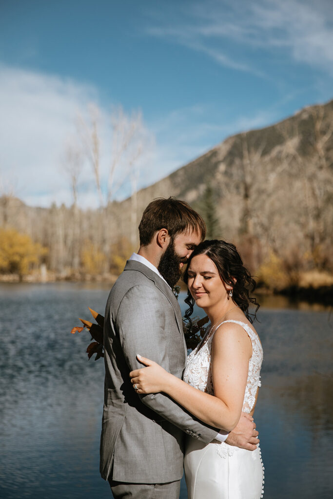 cute couple hugging during their bridal portraits 
