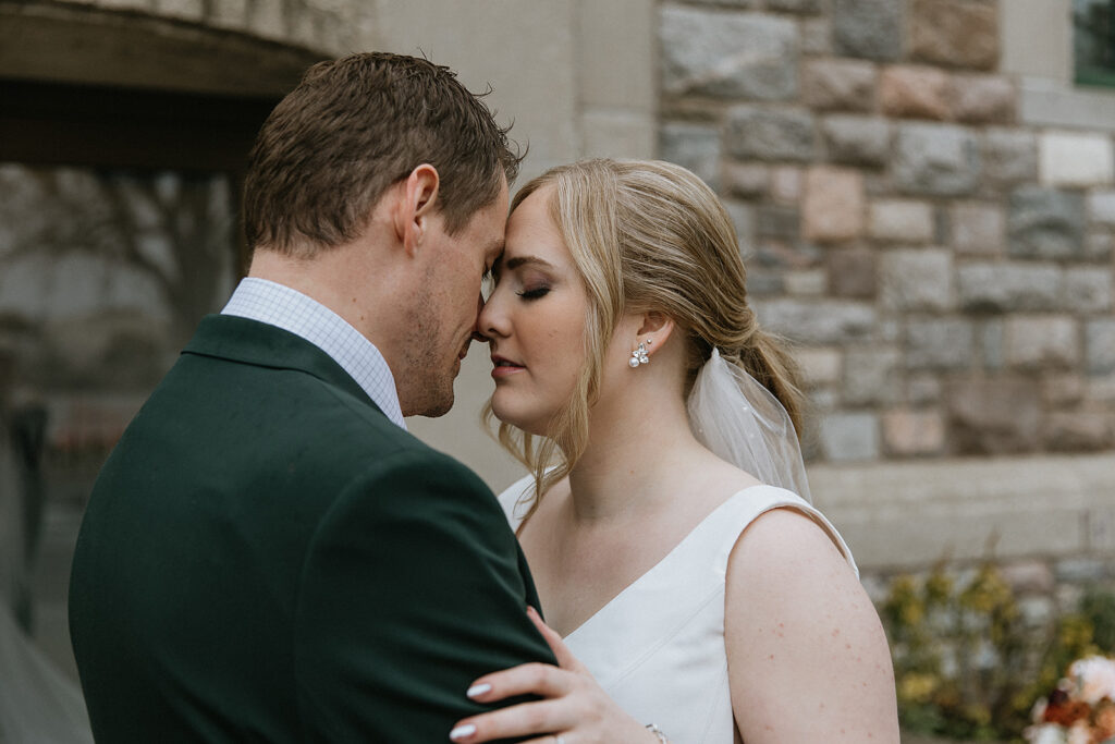 Bride kissing the groom on the cheek