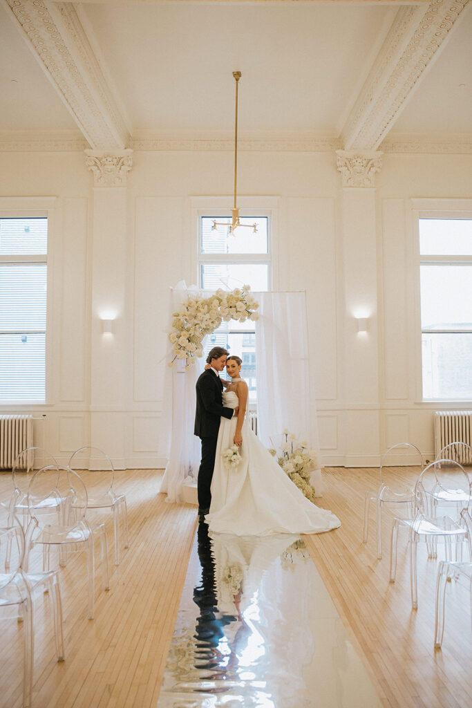picture of the bride and groom hugging