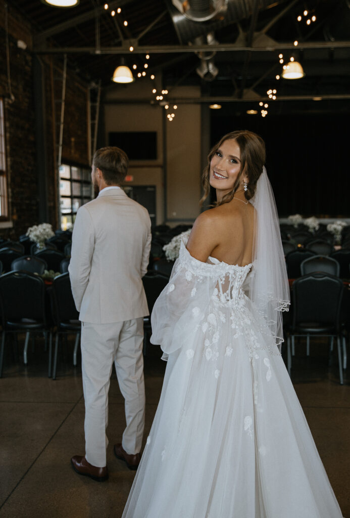 bride and groom at their first look