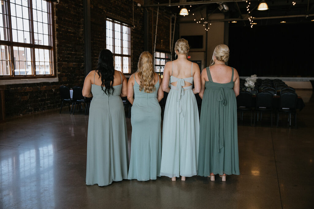 first look between the bride and her bridesmaids