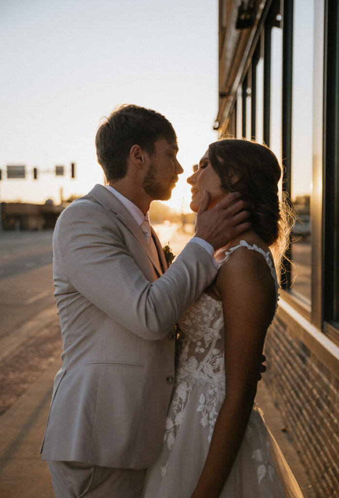 portrait of the bride and groom smiling at each other