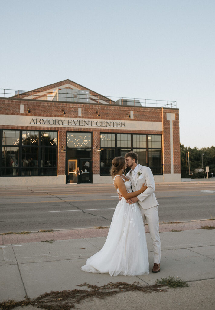 picture of the newly married couple kissing