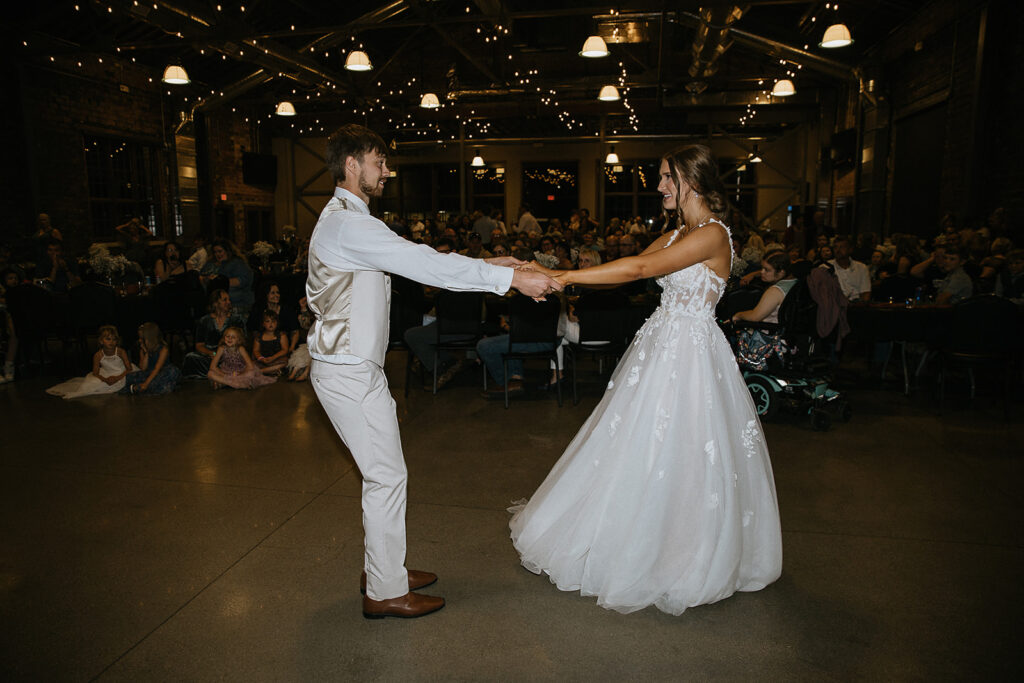 bride and groom at their first dance 