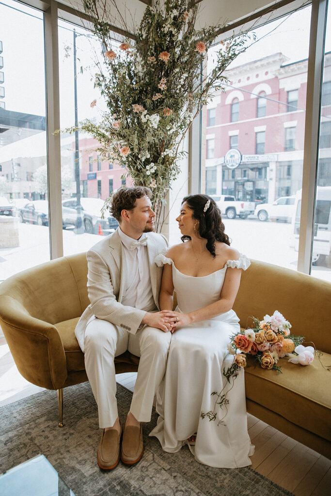 cute picture of the newlyweds smiling at each other
