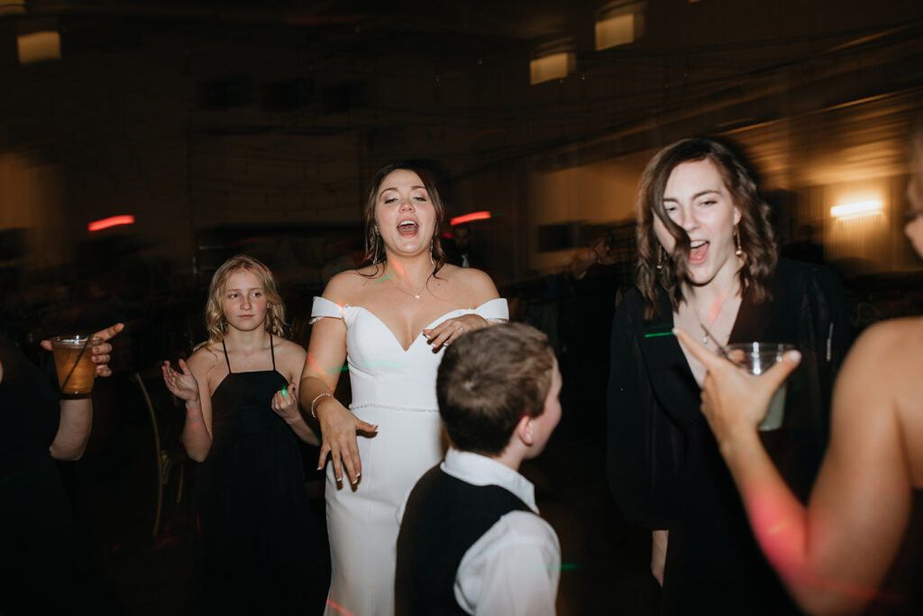 bride having the best time at her reception party