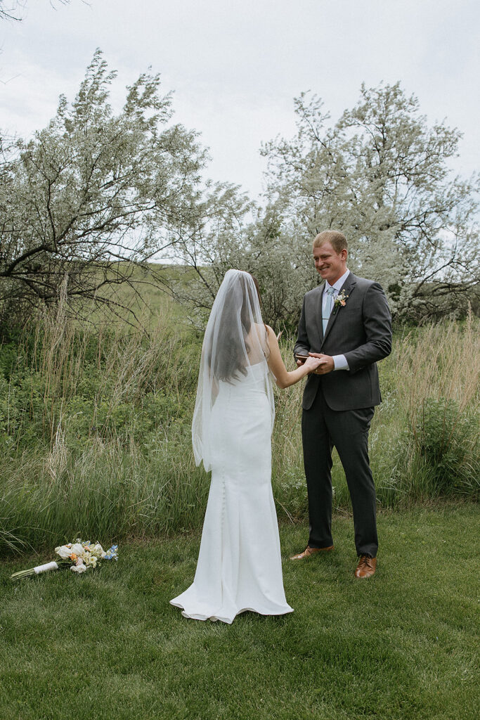 Bride and groom reading their private vows