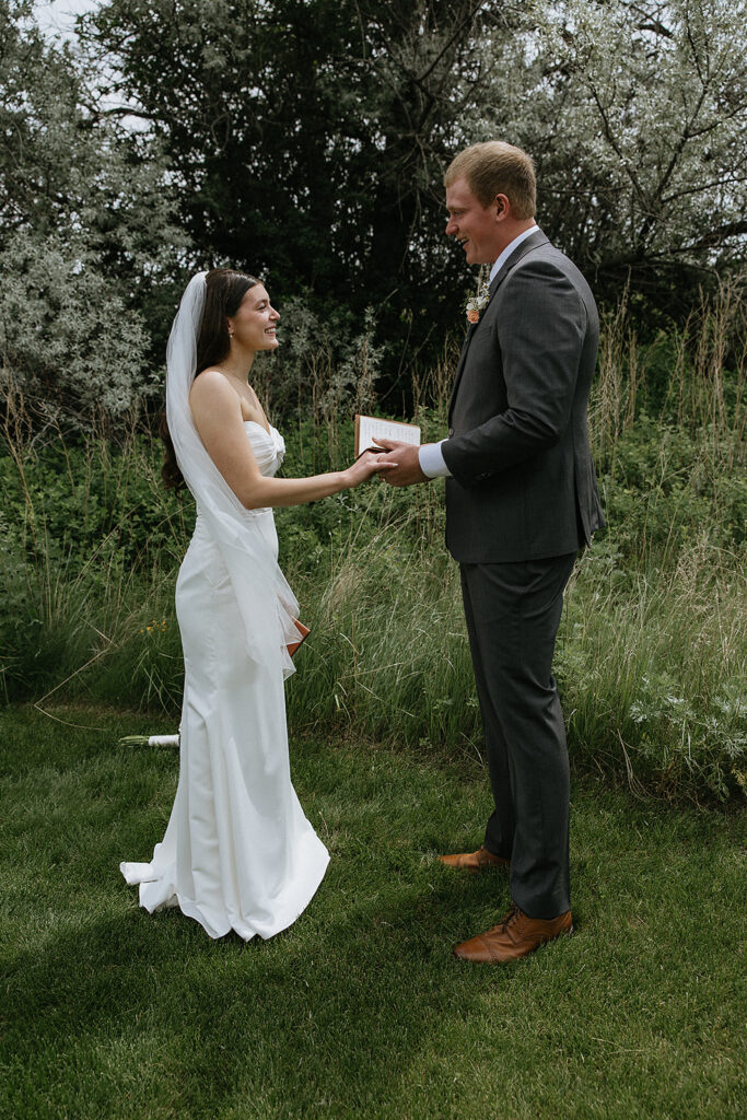 Cute picture of the bride and groom holding hands