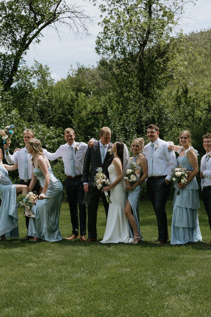 Picture of the bride and groom with their friends