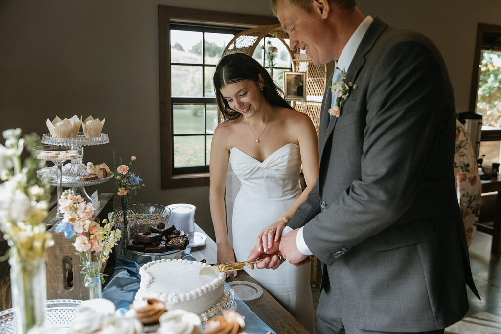 Picture of the newly wet cutting their wedding cake
