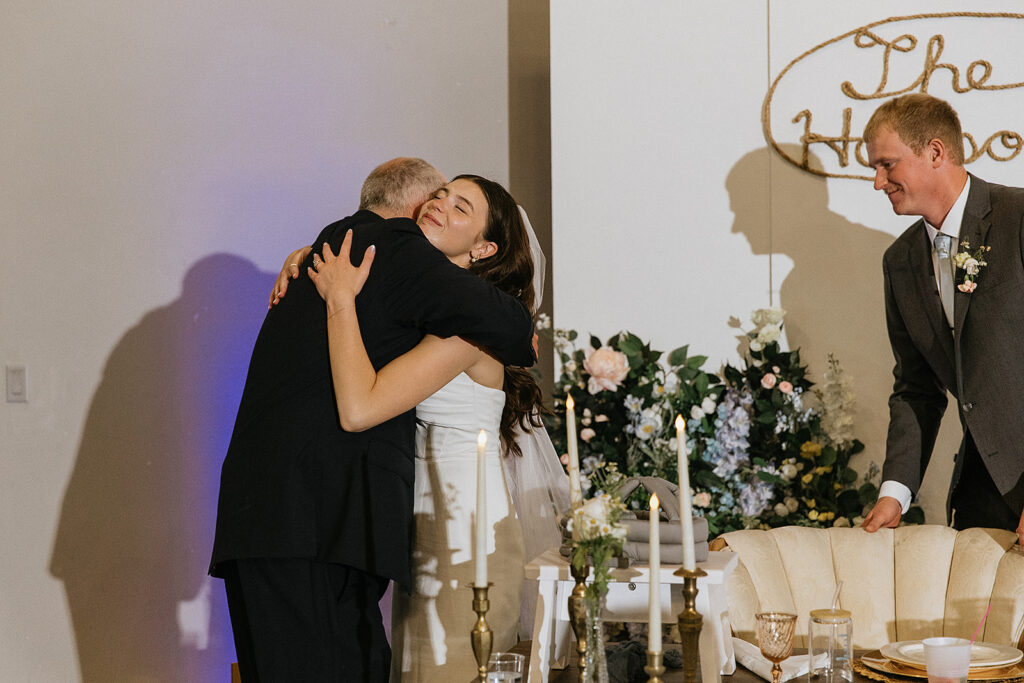 Newlyweds emotional during their wedding reception, speeches