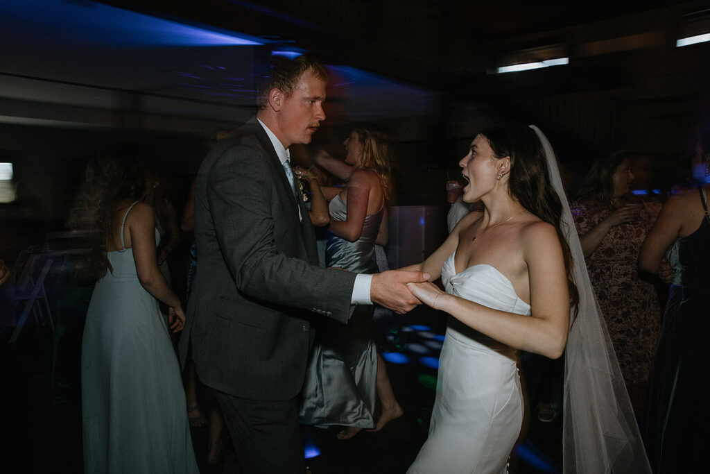 Bride and groom dancing at their reception party