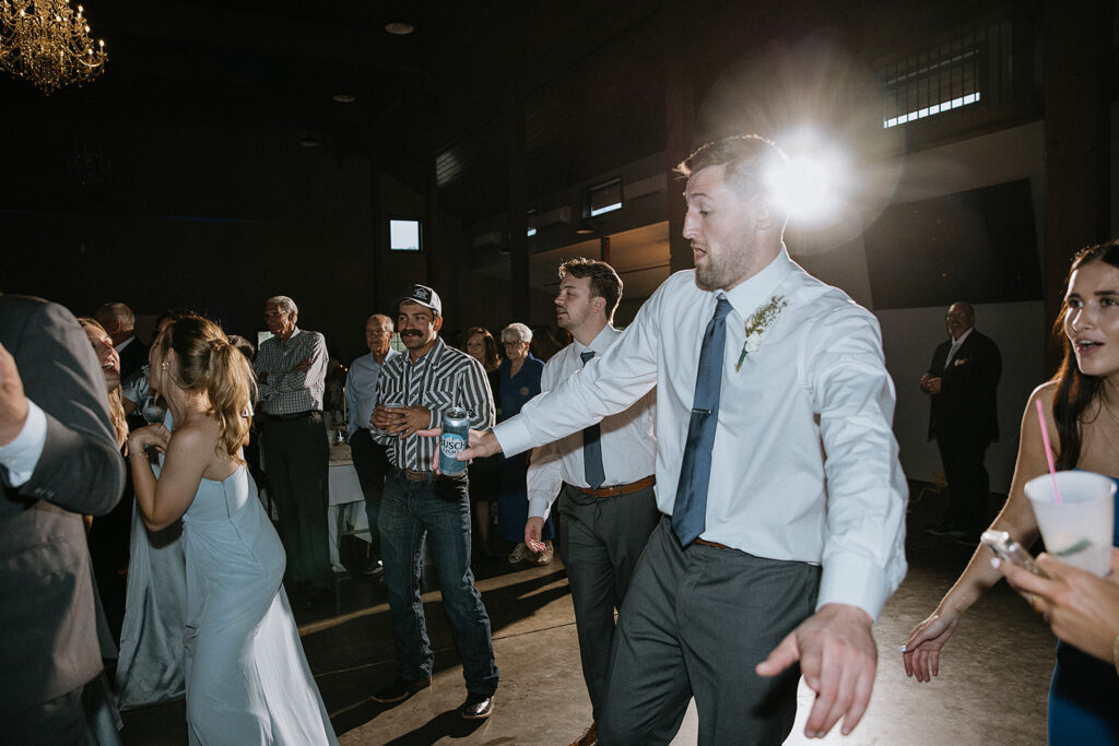 Groomsmen dancing at the reception party