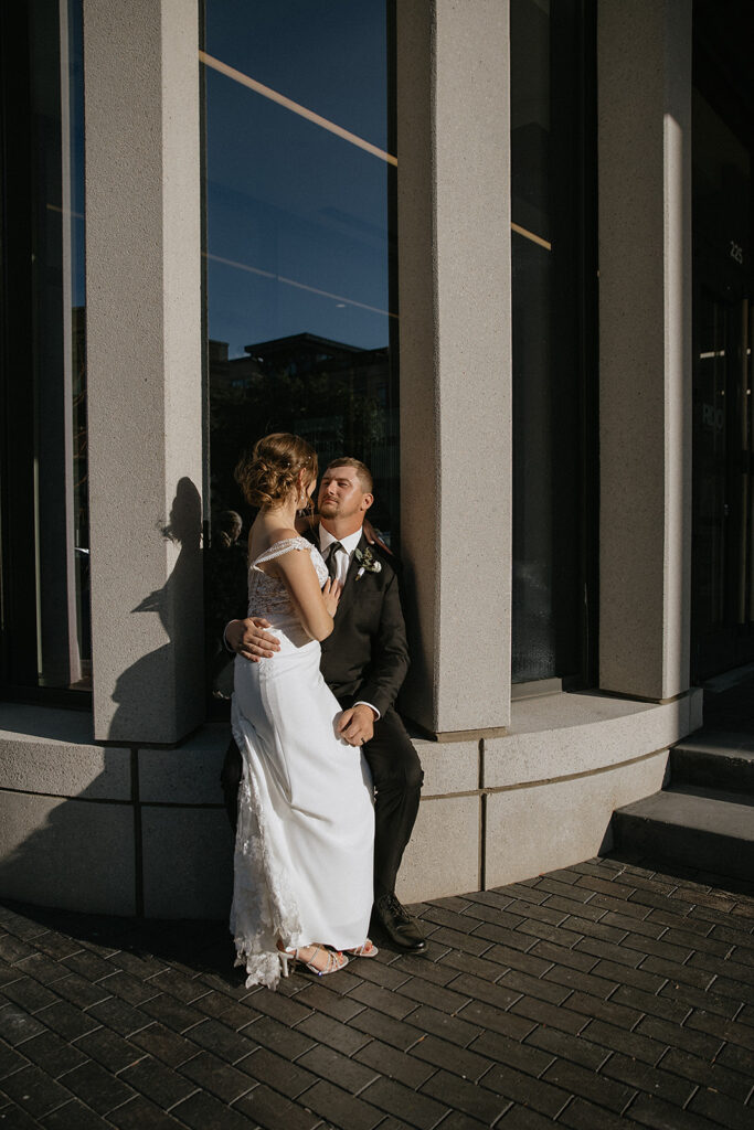 Cute picture of the bride and groom, smiling and looking at each other