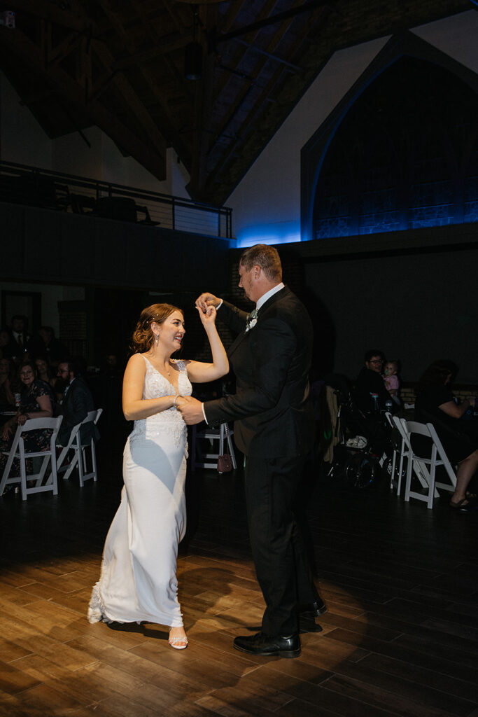 Cute picture of the newlyweds first dance at their reception party