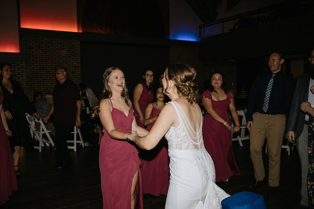 bride and her friends dancing
