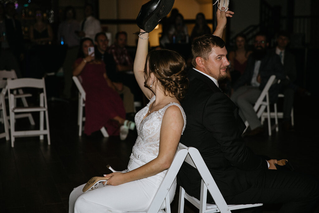 bride and groom at their fun wedding reception party