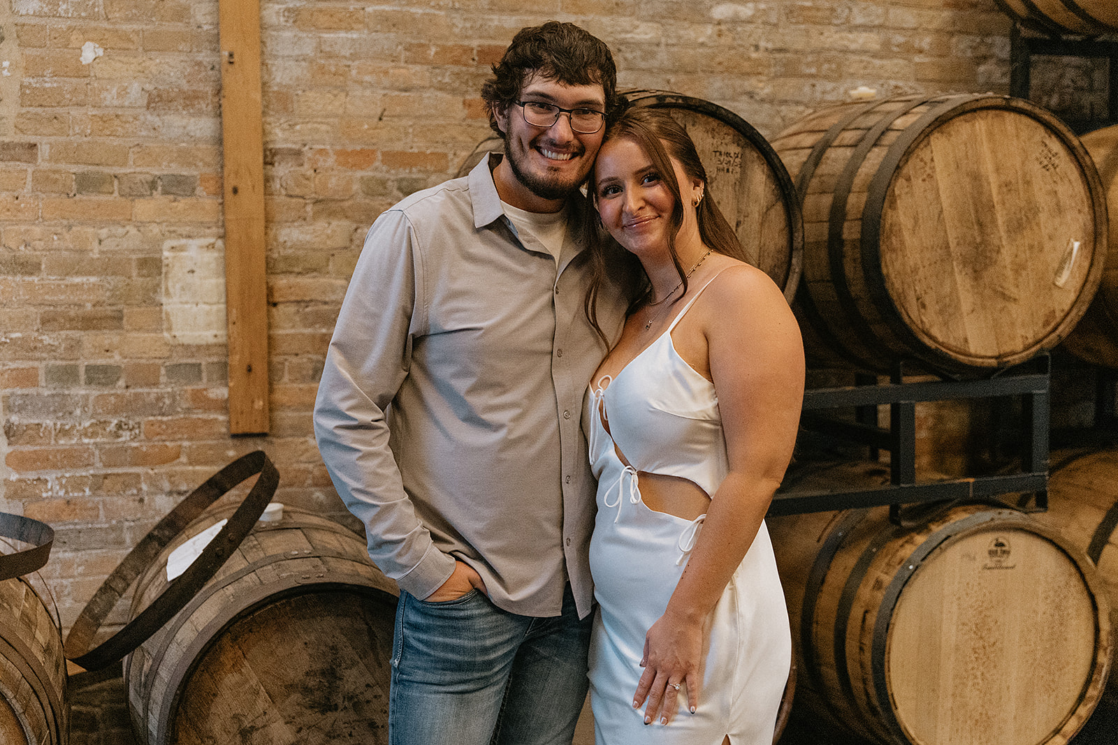 cute couple posing for the camera during their photoshoot