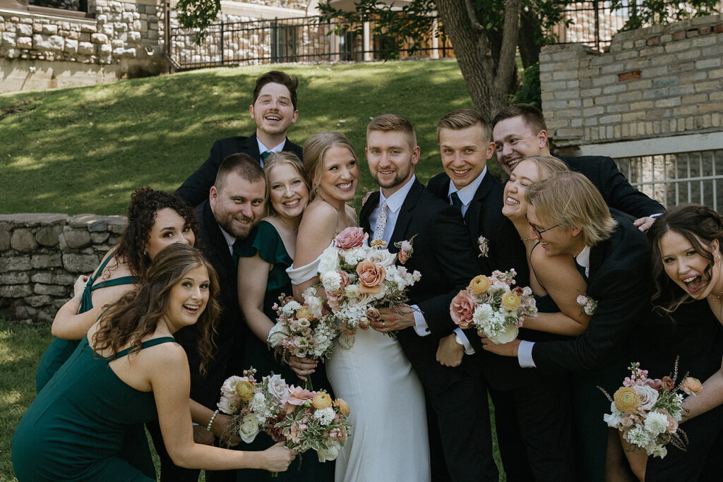 picture of the bride and groom with their bridal parties