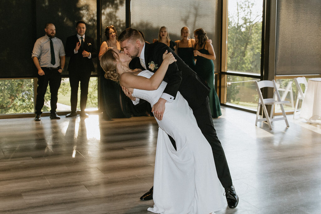 couple kissing after their first dance