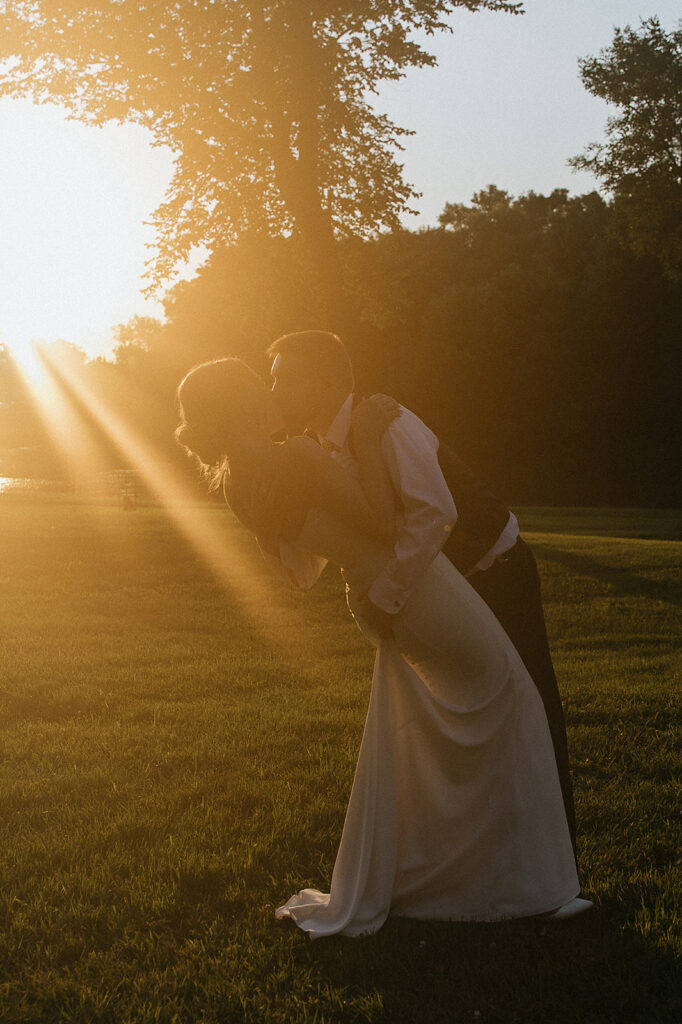 picture of the bride and groom kissing during their photoshoot