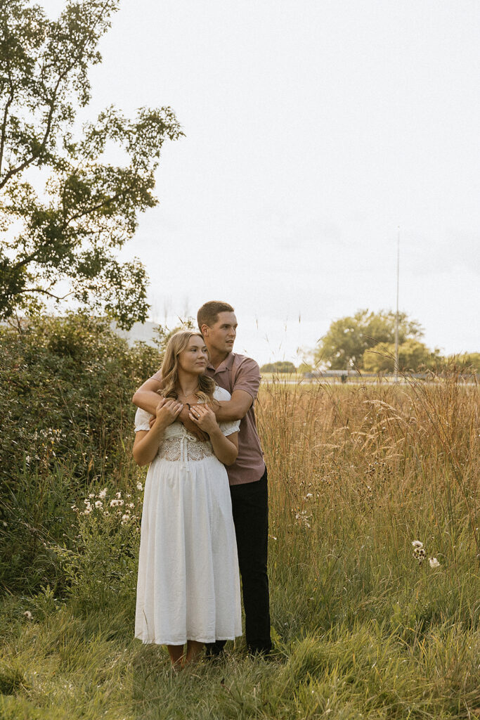 Cute picture of the newly engaged, couple hugging
