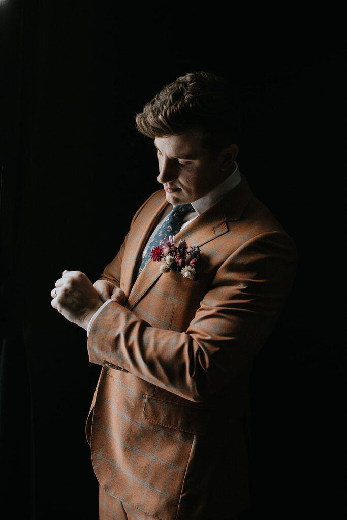 groom getting ready for his wedding ceremony