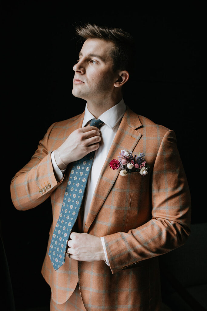 groom before his first look with the bride
