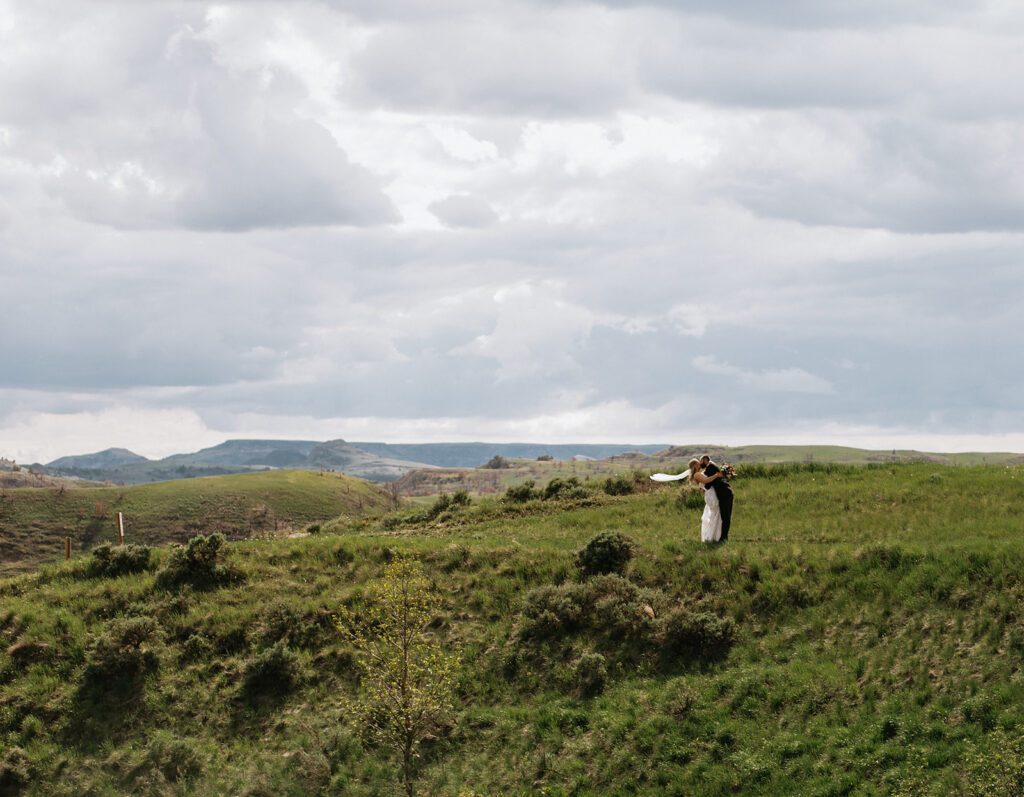 picture of the newlyweds kissing during their bridal portraits