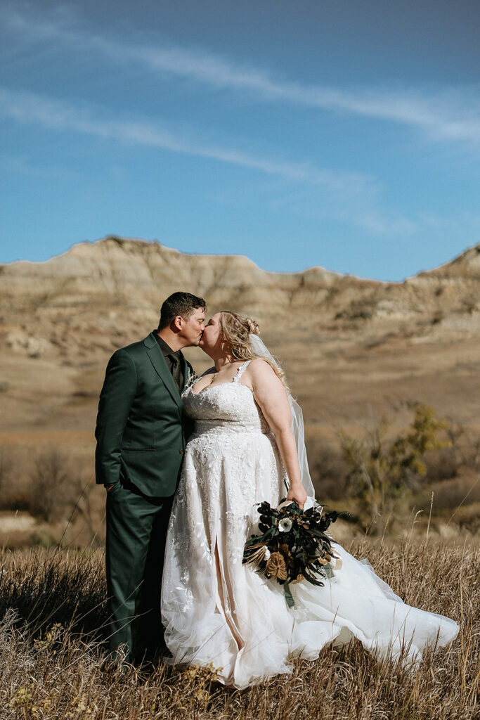 picture of the newlyweds kissing 