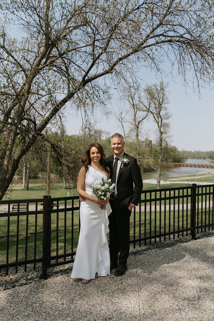 cute picture of the bride and groom at their dream wedding venue