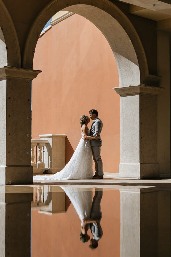 bride and groom hugging during their session