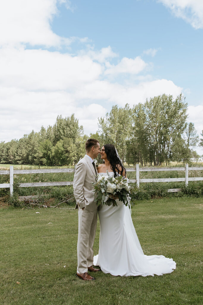 picture of the bride and groom kissing
