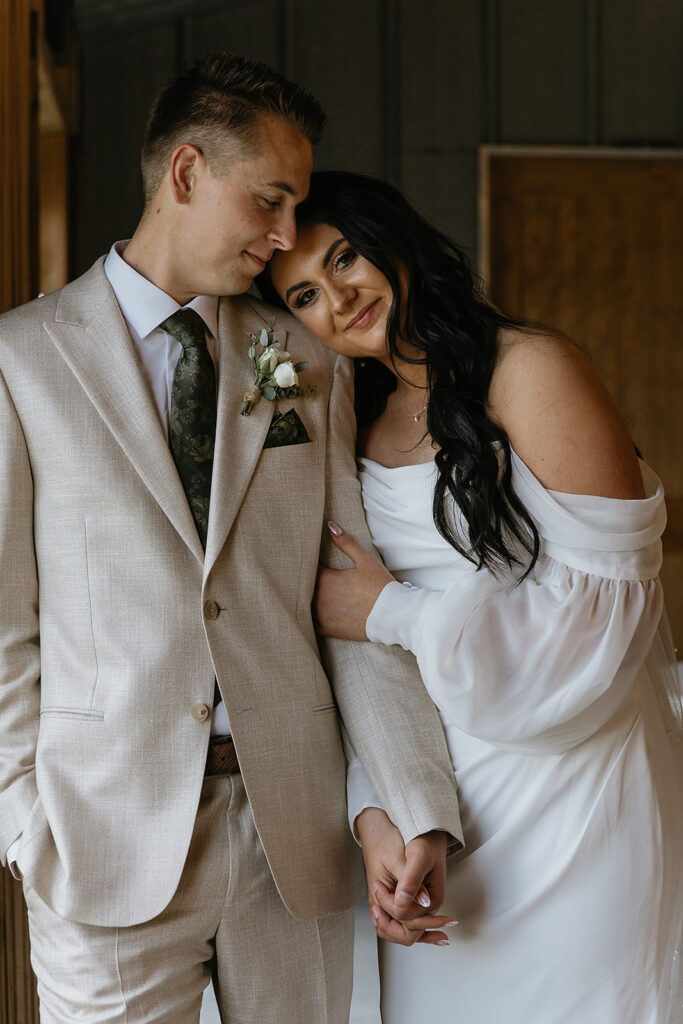 cute picture of the bride and groom hugging