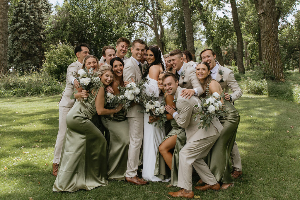 picture of the bride and groom with their bridal parties