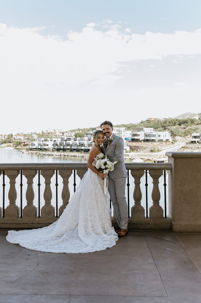 cute picture of the bride and groom hugging