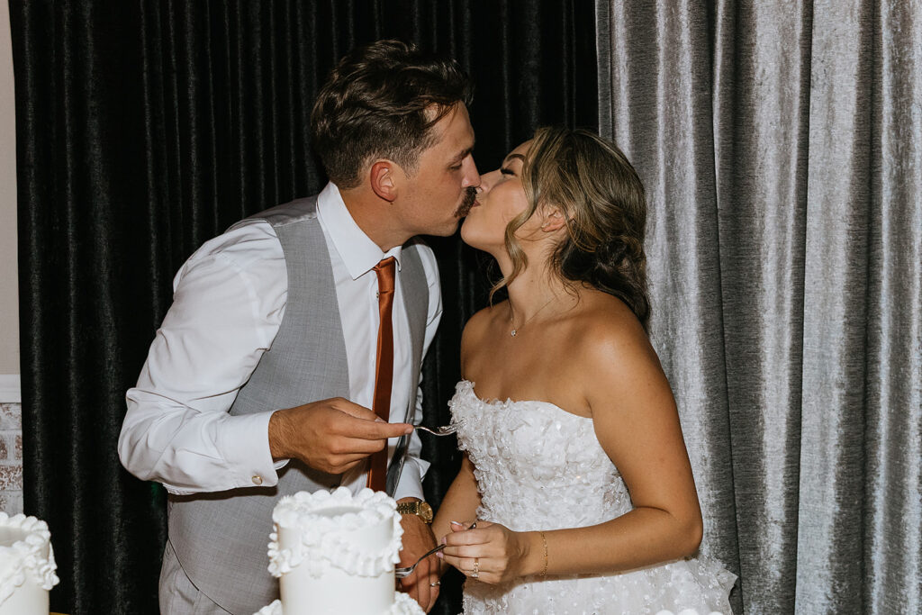 cute portrait of the newlyweds kissing