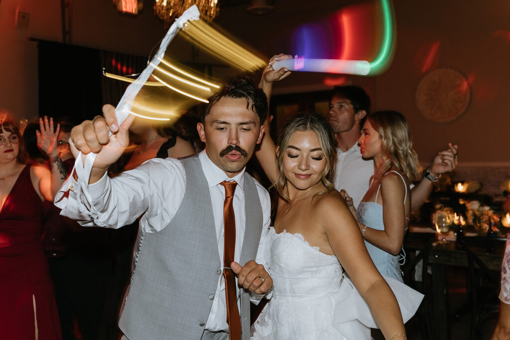 cute picture of the newlyweds dancing at their reception party