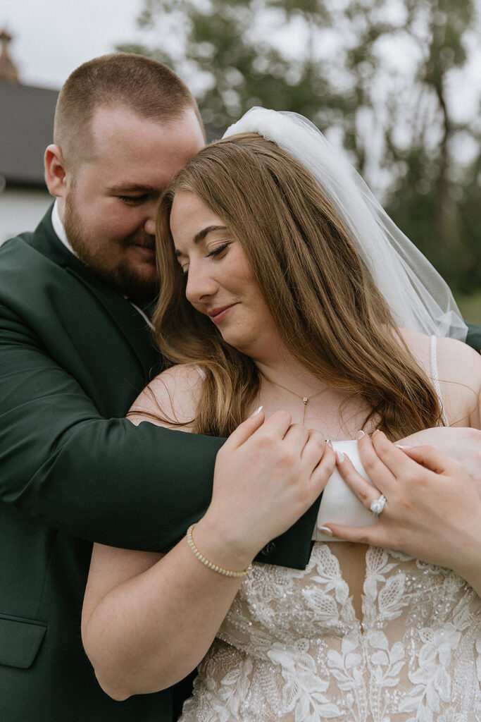portrait of the newlyweds hugging